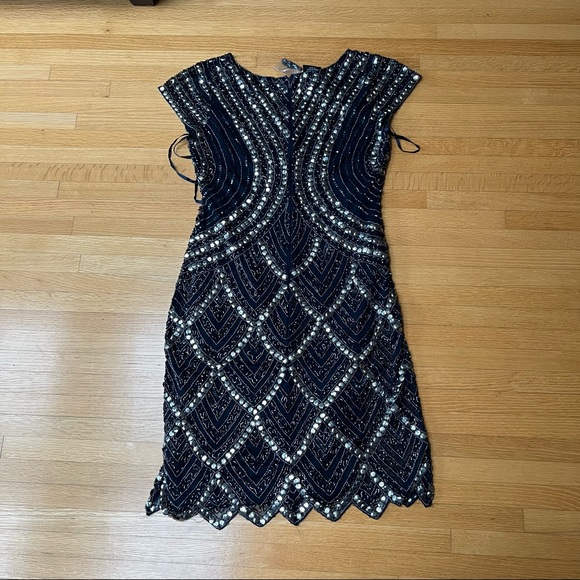 PISARRO NIGHTS black dress with metal nailhead design and a scalloped hem - Picture 13 of 13